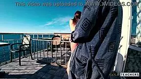 Live show of a young couple making love on a balcony using a Smartphone