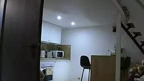Young Latina wife strips and bares herself in the kitchen