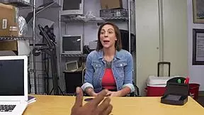 Pornstar bottom is fucked by director’s black dick on the office table