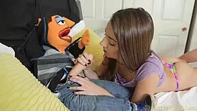 Lily Adams gets a large facial from the artificial partner