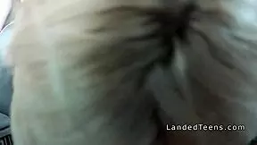 A young blonde woman hitchhiking receives facial from stranger