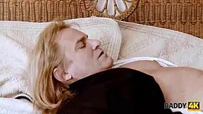 Three men conduct an elder man while he has intimate sex with a female who is to be wed to him in the next coming days