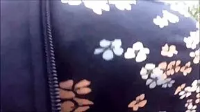 Big-breasted girl pees comfortably