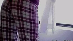 Young girl attempting to control a very stiff penis