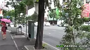 A shy Asian girl touches both giving and receiving from a perfectly mushed Caucasian mate