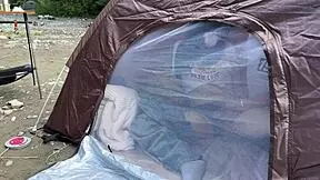 Young and beautiful college girl has fun with her voice while having sex in a tent in the woods