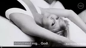 Young Charlize Theron and Peter Sellers in a steamy scene in 2004