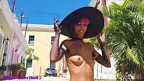Goth teen flaunts her assets in public cemetery dance routine