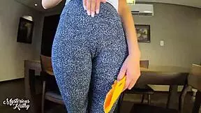 Leggy Latina in leggings, ready for action in gym