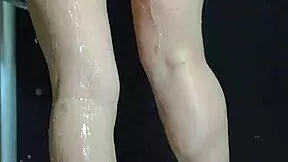 Young women in college wash their bodies with soap and have an orgasm in the shower