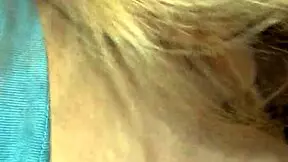 A beautiful blonde gives a deep blow job in a public place