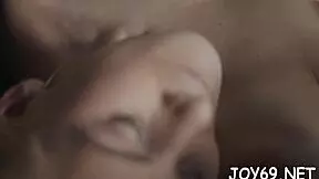 Young woman with small breasts pleases herself by rubbing her vagina