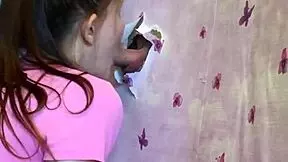 A young European couple tries out a glory hole in their home for the first time