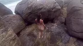 Beautiful sunny afternoon, sexy guy cruises beach for fun