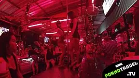 Asian bar girl shakes tight ass while dancing for crowd