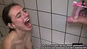 A German woman sucks and swallows sperm in a swinger club