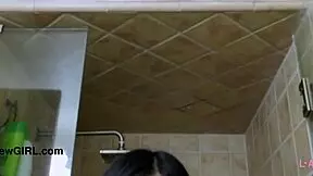 Asian model takes a bath and engages in some intimate play