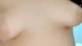 A cute fat girl is having a lot of fun in her bedroom