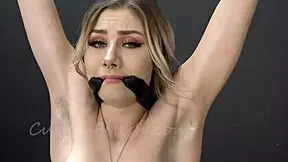 Succubus fetish model re-evoked and tortured within a cage rack